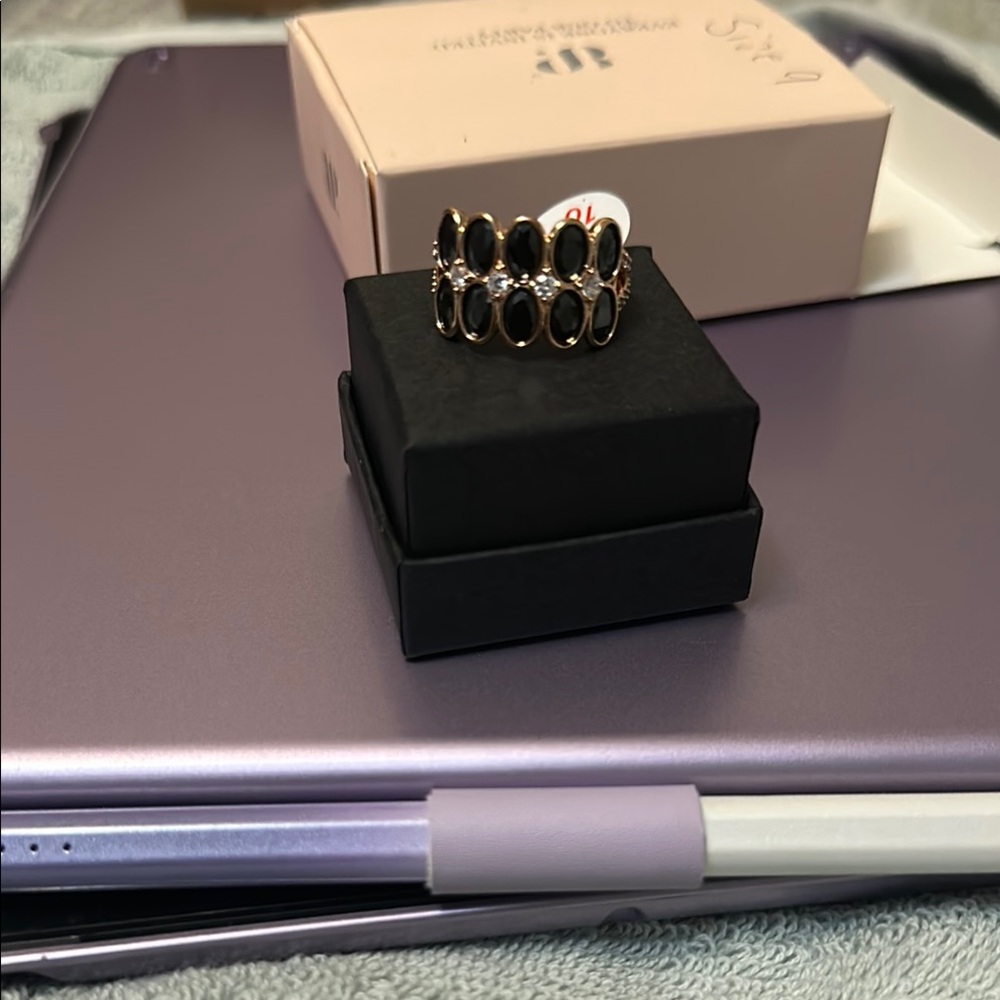 Elegant Black and Gold Ring